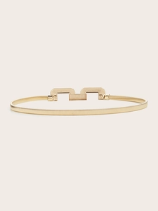 Elegant gold metal spring waist belt with minimalist geometric buckle for women dresses