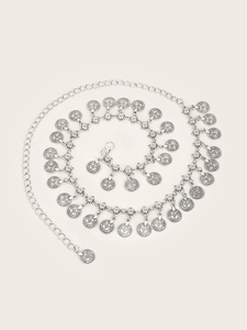 Detailed view of silver bohemian waist chain with vintage coin pendants and lobster clasp