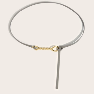 Summer gray slim leather belt for women featuring a gold twisted metal buckle and knot design