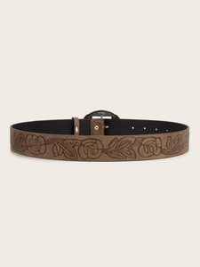 Detail of vintage brown leather belt featuring embossed floral rose patterns and silver buckle