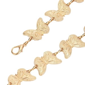 Golden vintage butterfly chain accessory for waist with detailed carved metallic texture