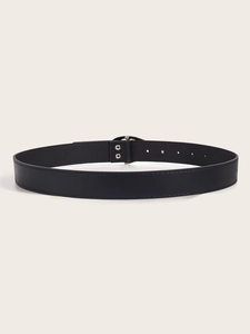 Close-up of black leather belt with silver rivets and detailed stitching accents