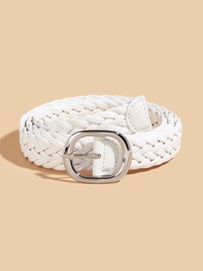 Detail of white woven belt with silver oval buckle and minimalist textured pattern
