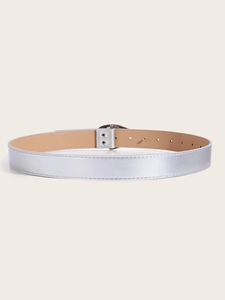 Detailed view of silver metallic belt with rhinestones and double-hole metal reinforcement