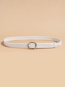 Macro view of white woven texture and silver oval metal buckle of this thin waist belt