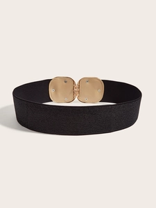 Close-up of the black elastic waist belt featuring a gold square buckle and faux leather inlay