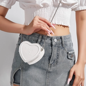 Minimalist white heart-shaped mini crossbody bag with a metal chain strap for women