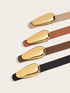 Detail of four thin leather belts in beige, tan, brown, and black with gold water-drop buckles