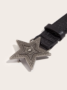 Detail of western black faux crocodile leather belt with vintage star buckle
