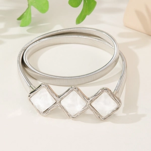 Women's silver spring belt with interlocking diamond buckle for dresses and shirts