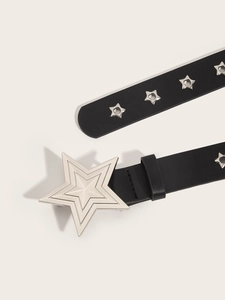 Detail of black punk leather belt featuring large silver star buckle and star-shaped eyelets