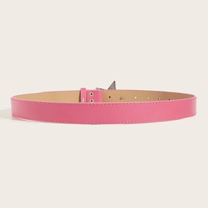 Pink women leather belt with star buckle and stitching on light background