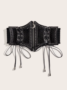 Detail of gothic waist cincher featuring lace trim, metal studs and moon zipper pull