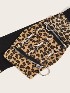 Detail of leopard print wide elastic corset belt with silver hardware and punk studs