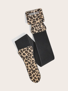 Close-up of wide elastic belt featuring leopard print pattern and square pin buckle detail