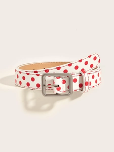 Detailed view of white Y2K belt with red polka dots and matte silver square buckle