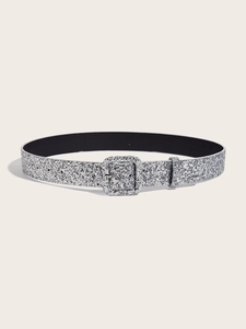 Detailed view of women's silver glitter belt with a matching square pin buckle for coats
