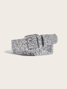 Close-up of women's silver glitter belt with matching square buckle and shiny sequins
