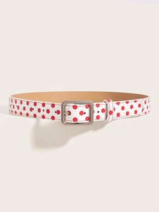 Close-up of red polka dot women belt with frosted silver buckle on minimalist platform