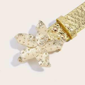 Chic gold floral buckle belt with metallic snakeskin texture for stylish women denim