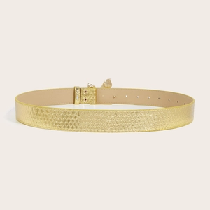 Modern gold faux snake skin belt for jeans featuring a smooth metallic buckle