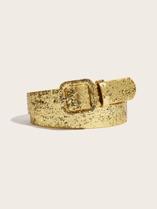 Detail of gold glitter belt with sparkly sequins and a matching square pin buckle