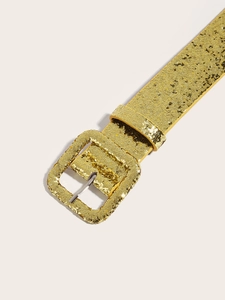 Detail of glitter gold women's belt with a matching rectangular pin buckle