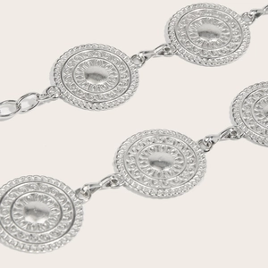 Vintage silver metal chain belt with embossed sun-patterned round discs for dresses