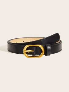Detail shot of black leather belt for women featuring a golden oval metal pin buckle