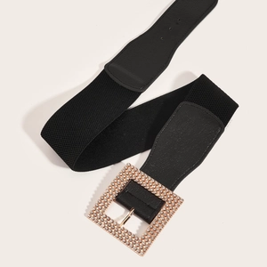 Women's black wide elastic belt with large square gold buckle and sparkling rhinestones