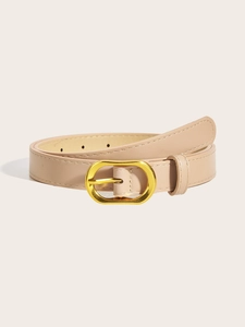 Close-up of minimalist thin leather belt with a polished gold oval metal buckle