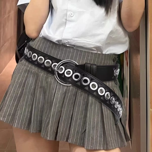 Punk style black PU leather double grommet belt with silver metal buckle on skirt