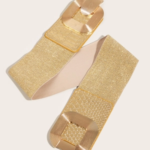 Elastic gold waist belt for dresses featuring dual textured rectangular metal buckles