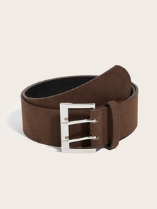 Close-up of dark brown wide suede belt featuring a vintage silver double-prong buckle