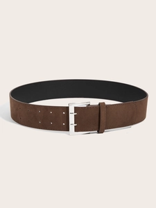 Detail of vintage brown suede wide belt with silver double-pin buckle and dual eyelets