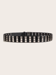 Close-up of black punk belt featuring three rows of square metal eyelets and alloy buckle