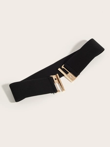 Detail of wide elastic waist belt for women with light gold metal interlocking buckle