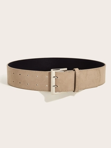 Detail of wide khaki faux suede belt with silver double-pin buckle and multi-hole design