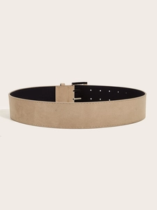 Detailed macro view of khaki suede wide belt featuring black metal buckle and double rows of eyelets