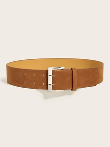 Detail view of brown suede wide belt with silver double-prong buckle and matte texture