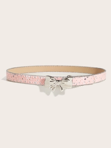 Detail of pink canvas belt with silver sequins and a metallic butterfly buckle