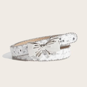 Detail of white lace belt with sequins and silver butterfly buckle on white background