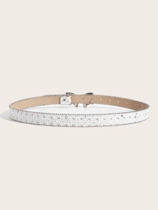 Detailed macro of white lace belt with silver sequins and a butterfly buckle closure