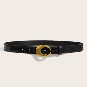 Women's black crocodile embossed leather belt with a vintage gold oval buckle