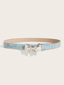 Detailed macro shot of light blue denim belt with silver beads and butterfly buckle