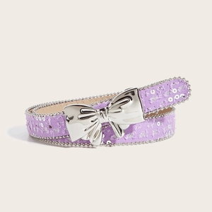 Detail of lavender tweed belt featuring a large silver metal butterfly buckle and bead trim