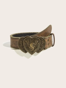 Detail of western brown leather belt with heart-shaped buckle and floral embossments