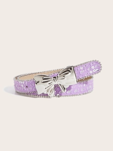Detail of purple tweed belt featuring silver sequins and a large metallic butterfly buckle