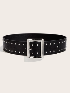 Close-up of black punk leather belt featuring double rows of silver studs and square buckle