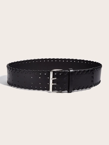 Close-up of black wide leather belt with woven edges and silver double-prong metal buckle